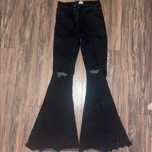 Black ripped flare jeans